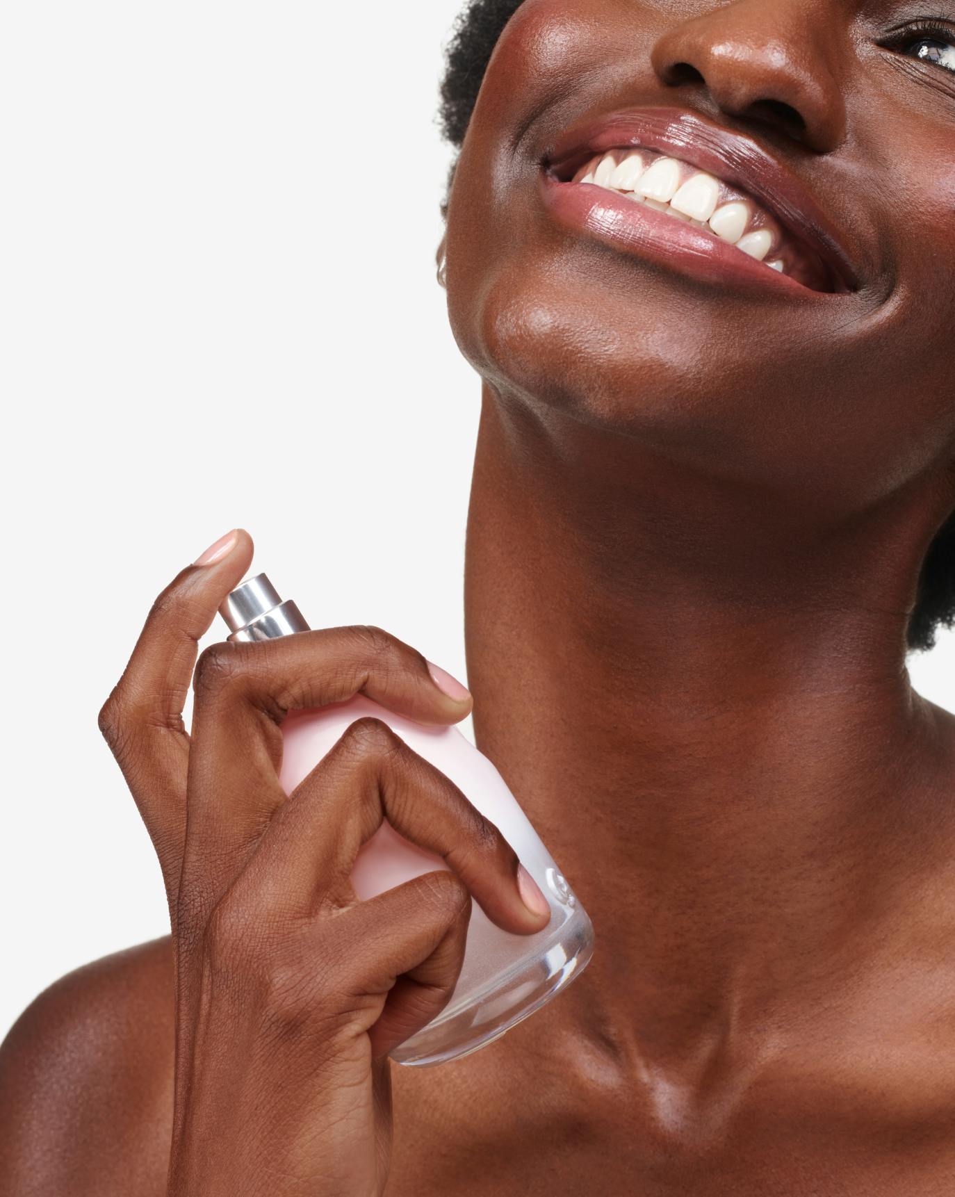 Mariama sprays Glossier you.